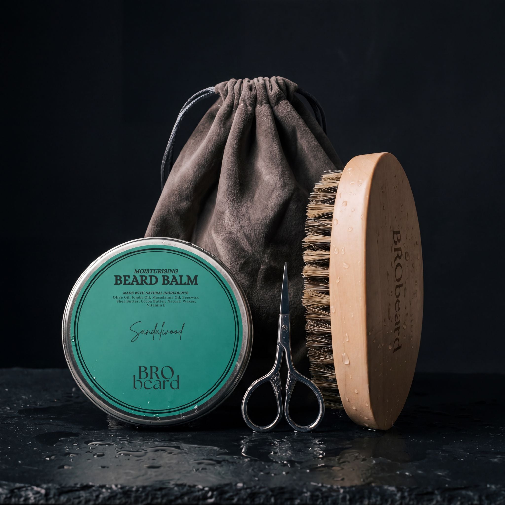 Beard care products including a tin of beard balm, brush, and scissors on a dark surface with a black background.